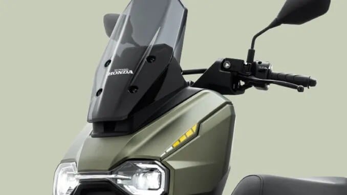 Rangkaian fitur canggih Honda HooRide 125 termasuk rem cakram ABS dual channel dan kontrol traksi HSTC